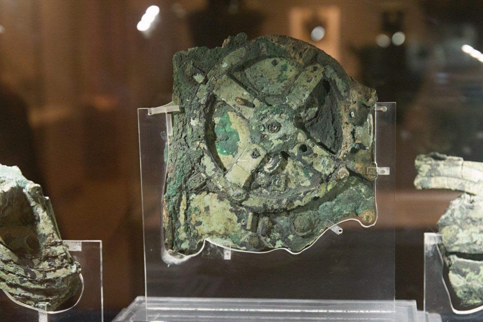 Corroded bronze fragment of the Antikythera mechanism with exposed gears